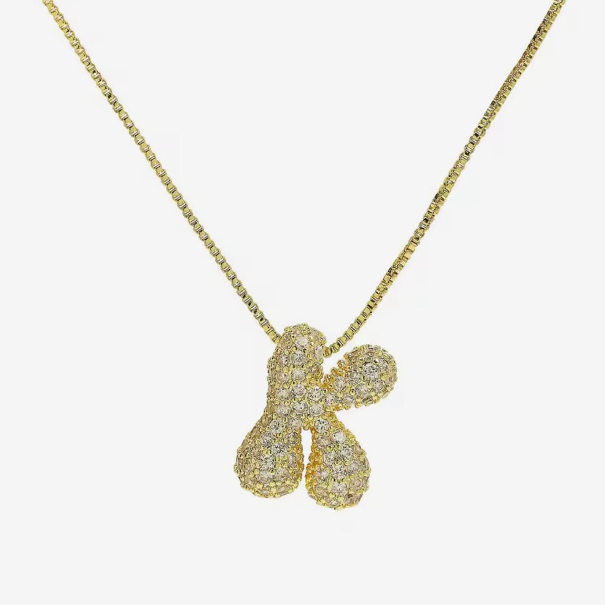 Cadena inicial bubble dorada con zirconias