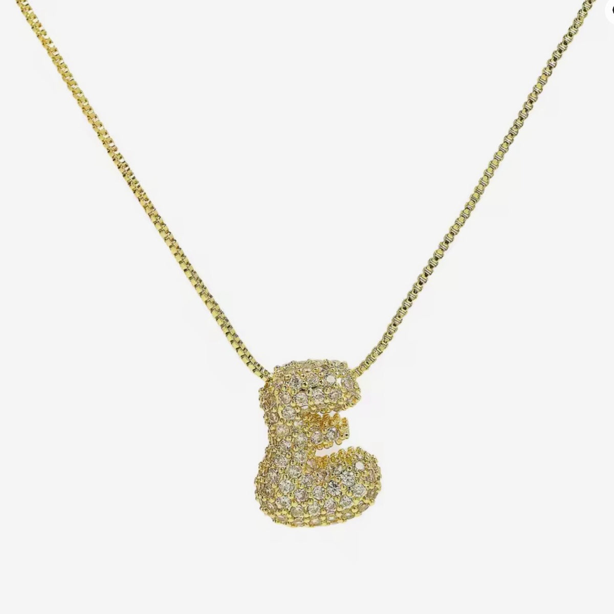 Cadena inicial bubble dorada con zirconias